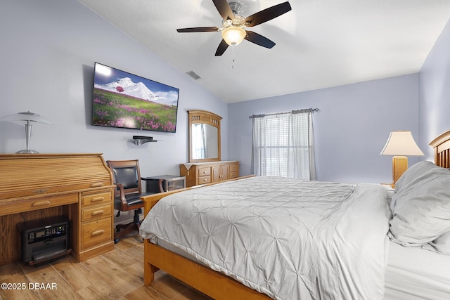 133 Brasswood Ct, Daytona Beach, FL 32117 - bedroom with vaulted ceiling, ceiling fan, visible vents, and light wood-style floors