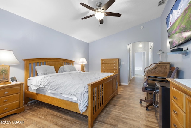 133 Brasswood Ct, Daytona Beach, FL 32117 - bedroom featuring light wood finished floors, lofted ceiling, a ceiling fan, and visible vents