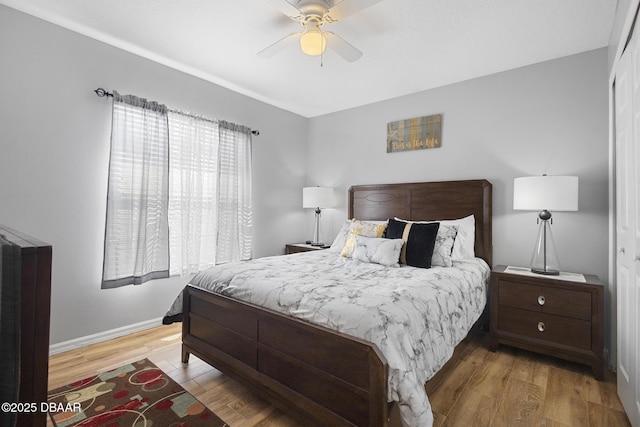 133 Brasswood Ct, Daytona Beach, FL 32117 - bedroom with baseboards, a ceiling fan, and wood finished floors