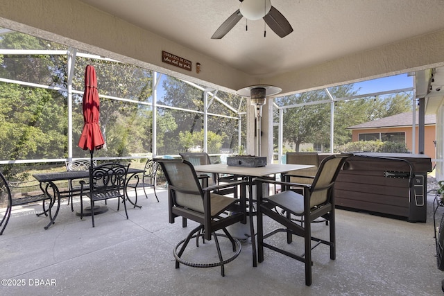 133 Brasswood Ct, Daytona Beach, FL 32117 - sunroom with ceiling fan and outdoor dining space