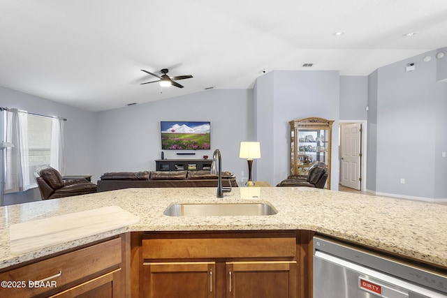 133 Brasswood Ct, Daytona Beach, FL 32117 - kitchen with brown cabinets, a sink, open floor plan, stainless steel dishwasher, and vaulted ceiling