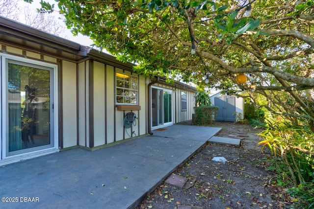 view of patio / terrace featuring a storage shed