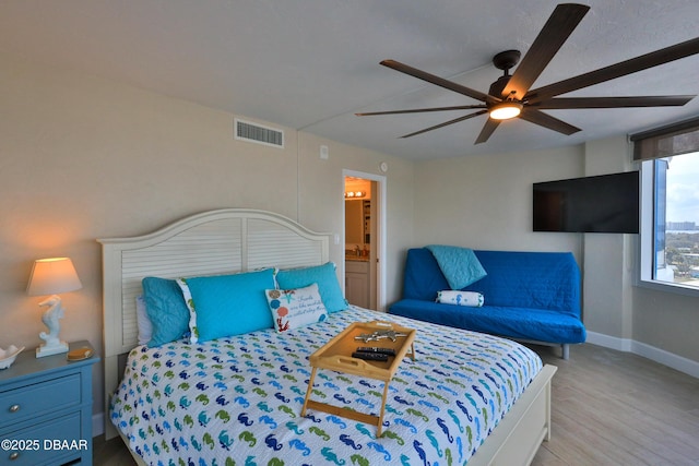 2625 S Atlantic Ave Unit 10Nw, Daytona Beach Shores, FL 32118 - bedroom with wood finished floors and a ceiling fan