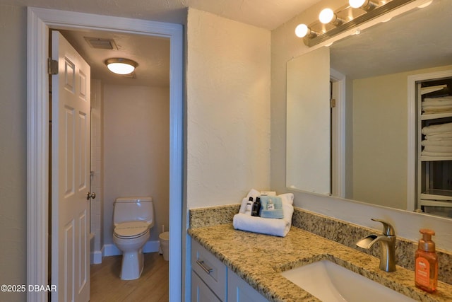 2625 S Atlantic Ave Unit 10Nw, Daytona Beach Shores, FL 32118 - bathroom with vanity and wood finished floors