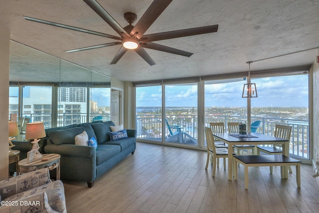 2625 S Atlantic Ave Unit 10Nw, Daytona Beach Shores, FL 32118 - sunroom featuring plenty of natural light and a city view