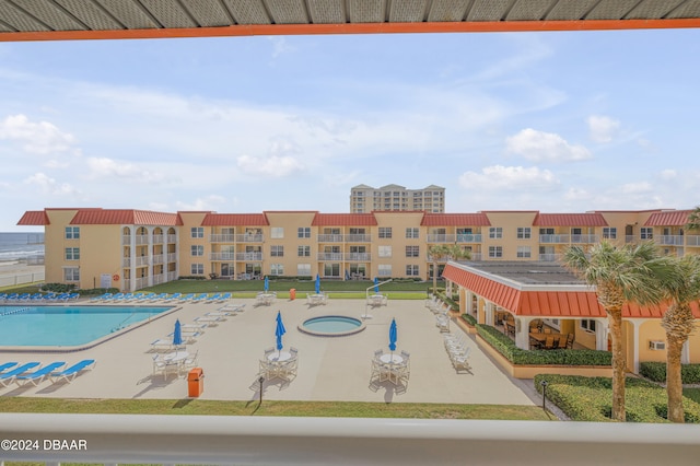 view of pool featuring a patio area