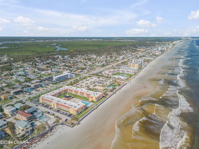 aerial view featuring a view of the beach and a water view