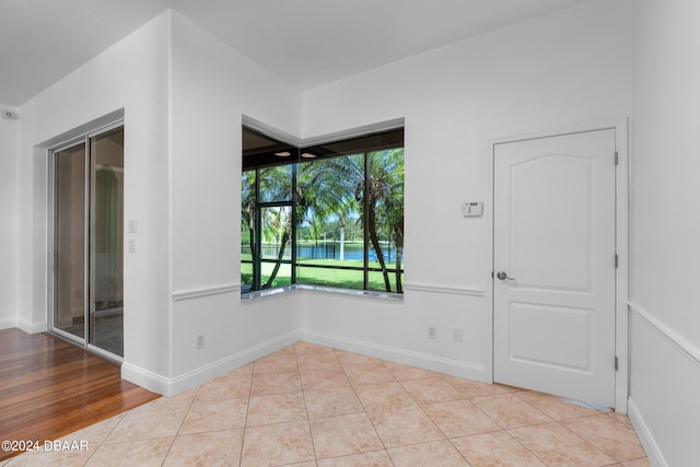 empty room with light tile patterned floors