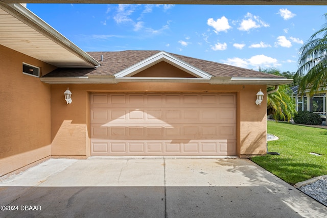 garage with a lawn