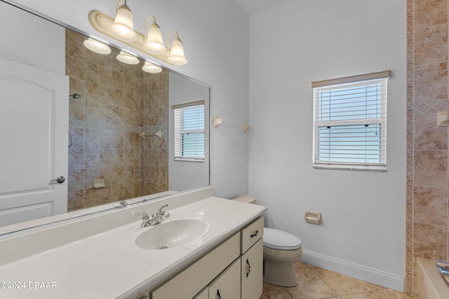 full bathroom featuring tile patterned flooring, vanity, a healthy amount of sunlight, and toilet