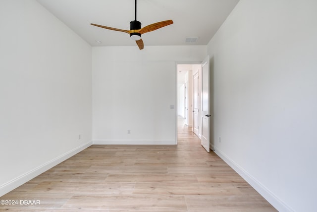 unfurnished room featuring ceiling fan and light hardwood / wood-style flooring