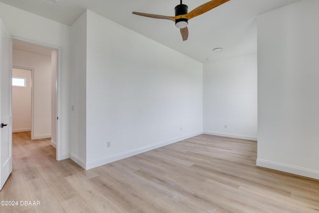 spare room with ceiling fan and light hardwood / wood-style floors