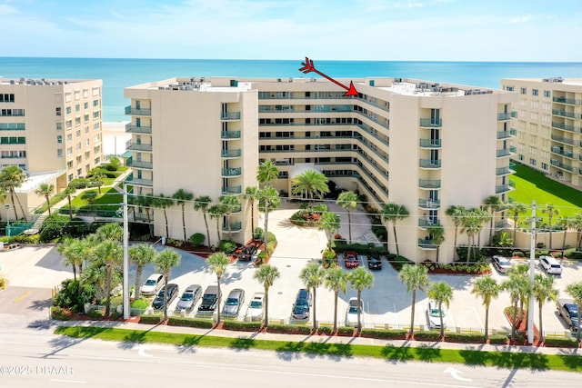 view of building exterior with a water view