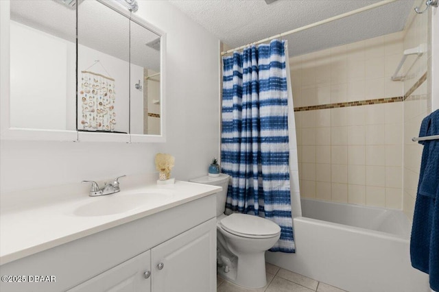 2711 N Halifax Ave Unit 372, Daytona Beach, FL 32118 - full bath with vanity, shower / bath combination with curtain, toilet, tile patterned floors, and a textured ceiling