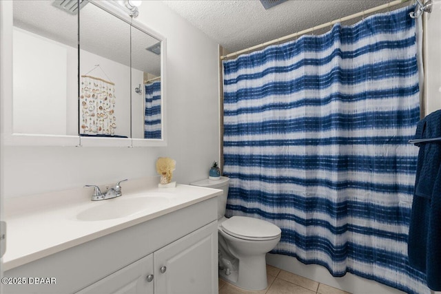 2711 N Halifax Ave Unit 372, Daytona Beach, FL 32118 - bathroom with vanity, a textured ceiling, toilet, tile patterned floors, and curtained shower