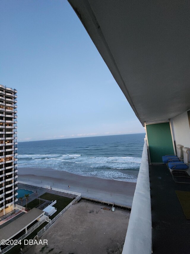 property view of water featuring a beach view