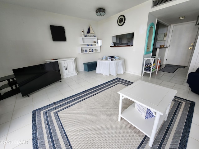 living room featuring light tile patterned flooring