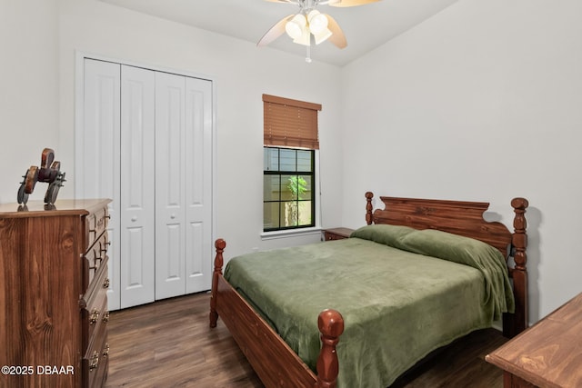 bedroom featuring a closet, ceiling fan, and dark wood-style flooring