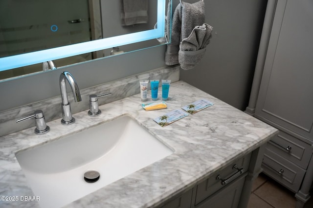 bathroom featuring vanity and tile patterned flooring