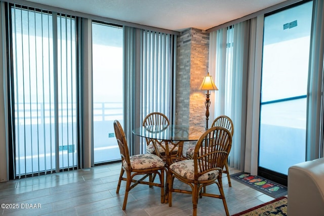 dining room featuring expansive windows