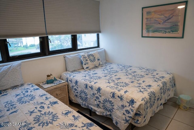 bedroom featuring tile patterned floors