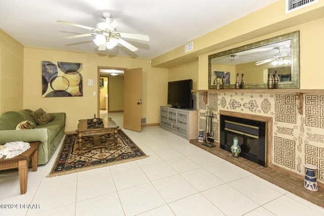 1199 N Halifax Ave, Daytona Beach, FL 32118 - living room featuring ceiling fan, a fireplace, and tile patterned flooring