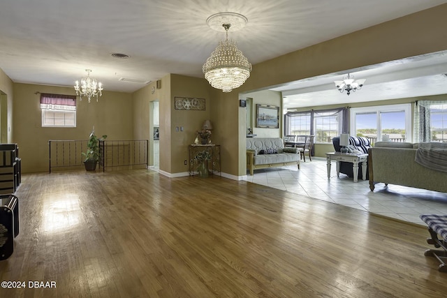 1199 N Halifax Ave, Daytona Beach, FL 32118 - living area featuring a chandelier and wood finished floors