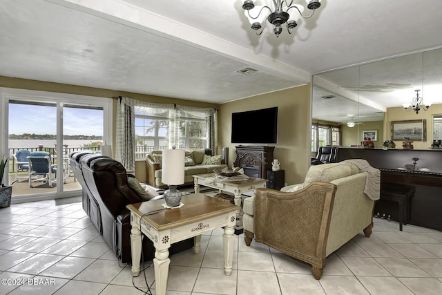 1199 N Halifax Ave, Daytona Beach, FL 32118 - living room with light tile patterned flooring, a chandelier, beamed ceiling, and a water view