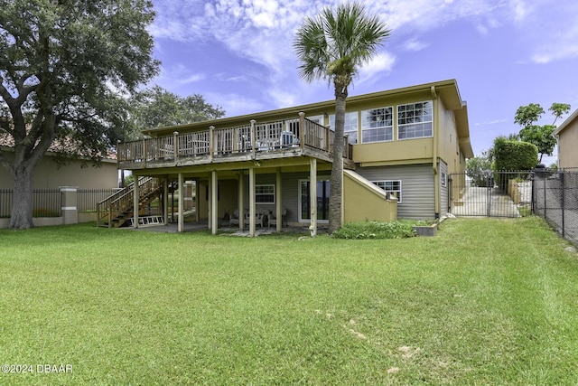 1199 N Halifax Ave, Daytona Beach, FL 32118 - rear view of property with stairway, a wooden deck, and a gate