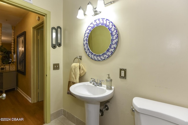 1199 N Halifax Ave, Daytona Beach, FL 32118 - half bath featuring toilet and baseboards