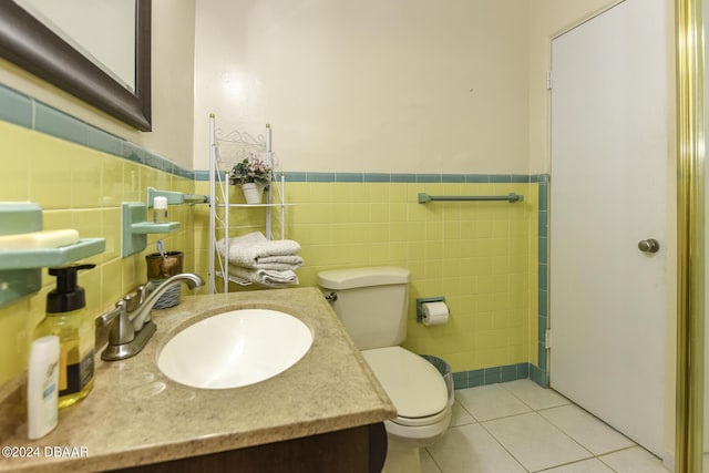 1199 N Halifax Ave, Daytona Beach, FL 32118 - bathroom with tile walls, tile patterned flooring, and wainscoting
