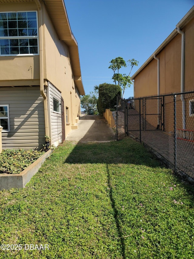 1199 N Halifax Ave, Daytona Beach, FL 32118 - view of yard with a gate