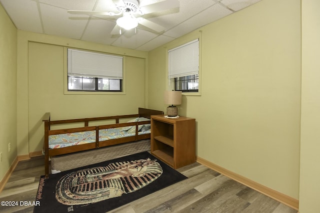 1199 N Halifax Ave, Daytona Beach, FL 32118 - bedroom with wood finished floors and a drop ceiling