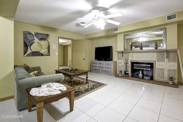 1199 N Halifax Ave, Daytona Beach, FL 32118 - tiled living area with a ceiling fan and a tiled fireplace