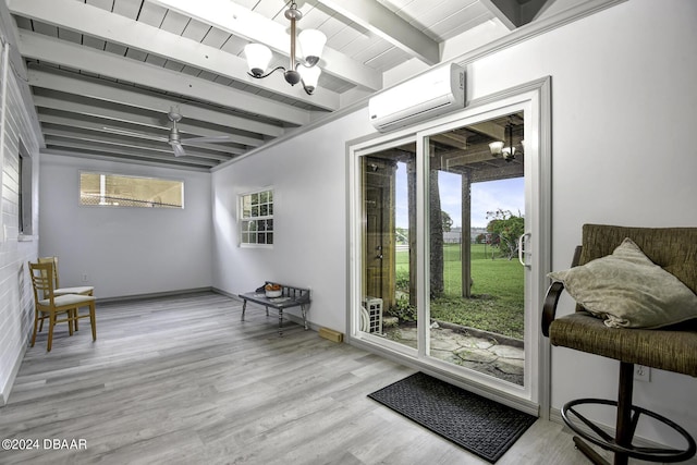 1199 N Halifax Ave, Daytona Beach, FL 32118 - living area with an AC wall unit, beam ceiling, a chandelier, and wood finished floors