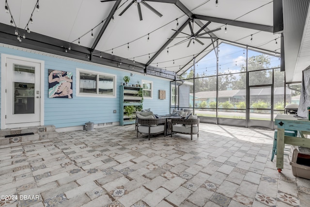 view of patio featuring a lanai