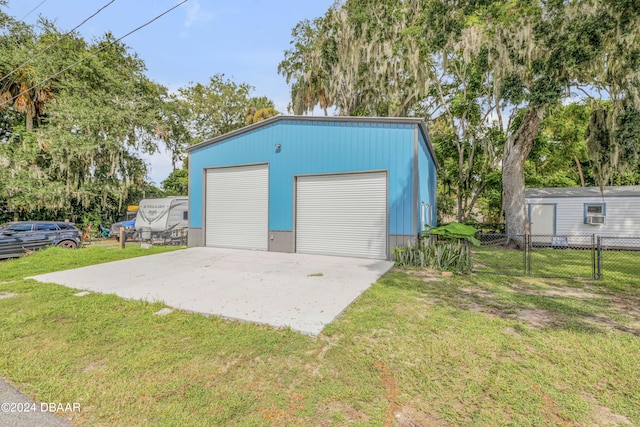 garage with a lawn