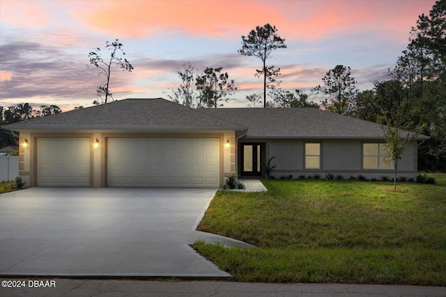 view of front of house with a lawn