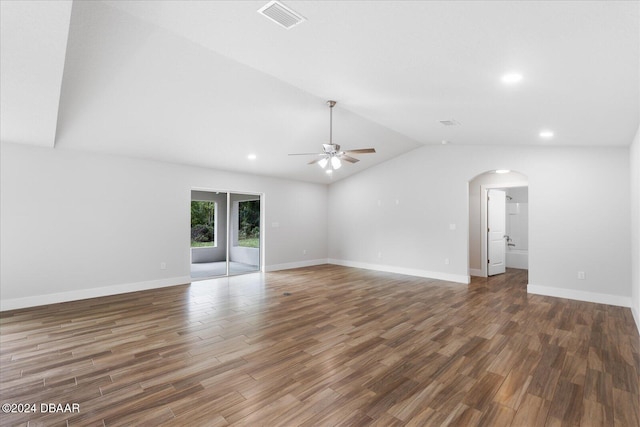 interior space with ceiling fan, lofted ceiling, and dark wood-type flooring