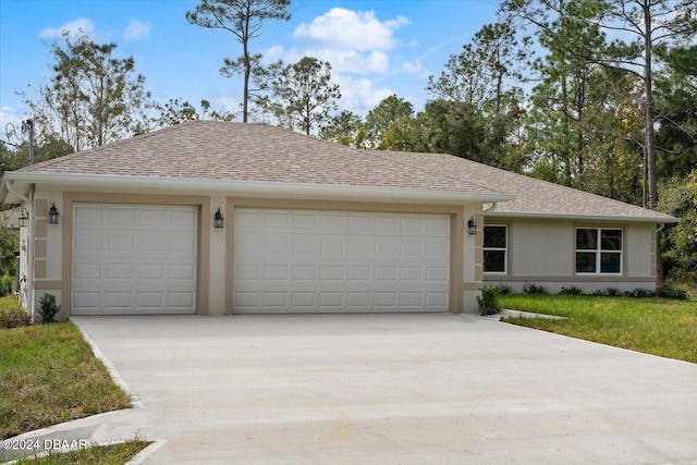 ranch-style home with a garage