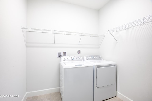 laundry area featuring washing machine and dryer