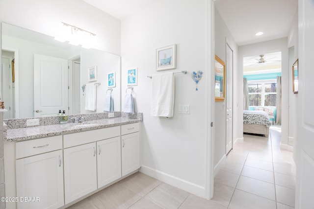 bathroom with vanity, tile patterned floors, and ceiling fan