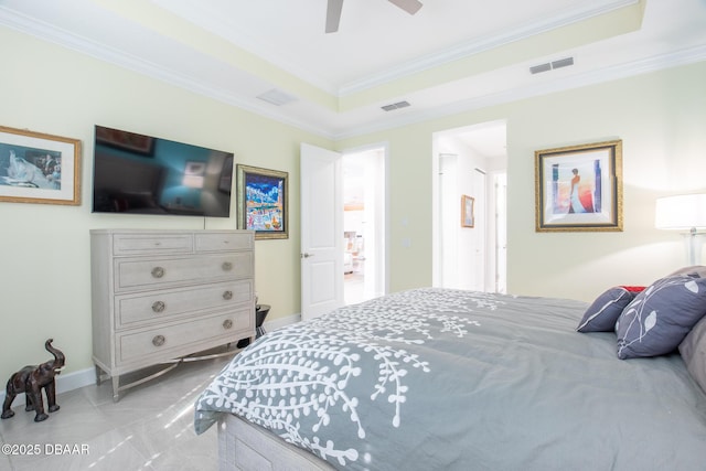 bedroom with crown molding, a raised ceiling, and ceiling fan