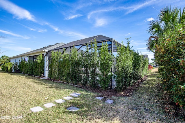 view of yard with a lanai