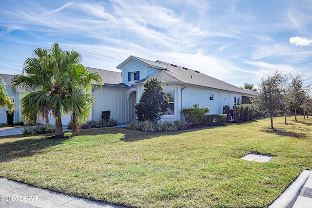 view of property exterior featuring a yard