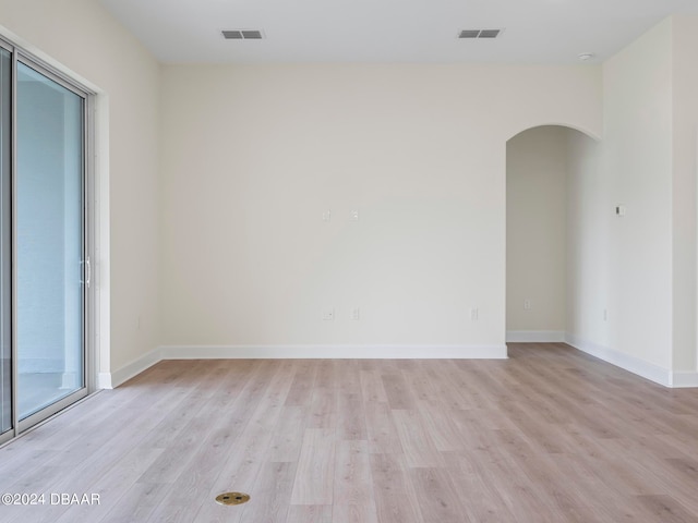 empty room with light wood-type flooring