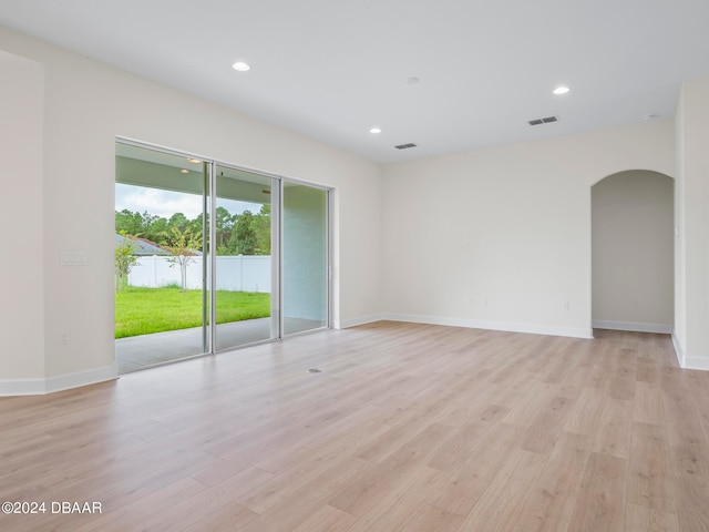 unfurnished room featuring light hardwood / wood-style floors