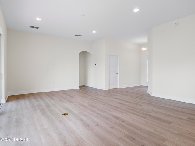 unfurnished room featuring light hardwood / wood-style flooring