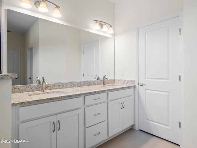 bathroom featuring vanity and tile patterned floors