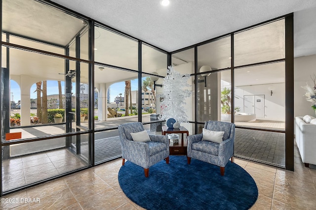 lobby with a view of city and a sunroom